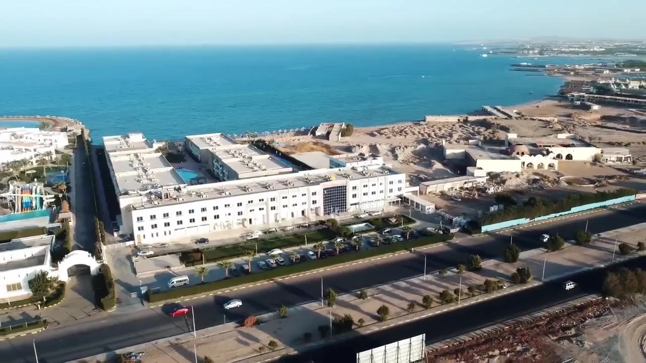 The resort from the air: the buildings, the road and the Red Sea beyond