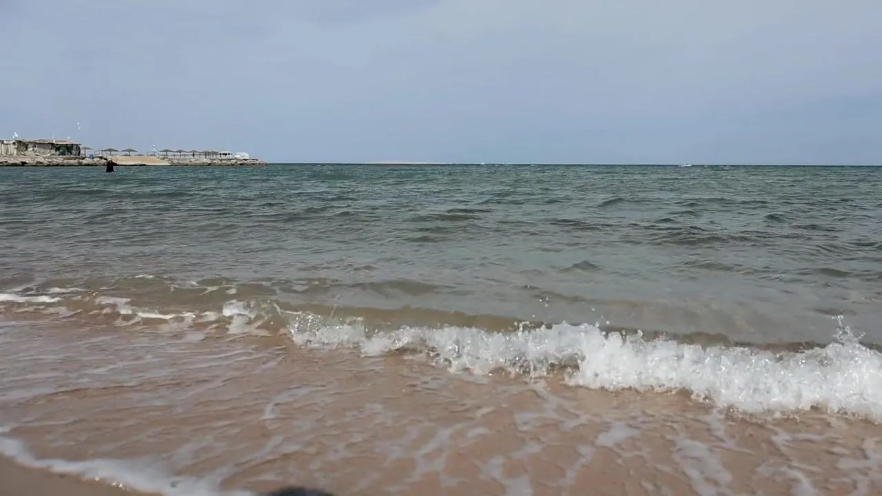 Small waves breaking on the sand